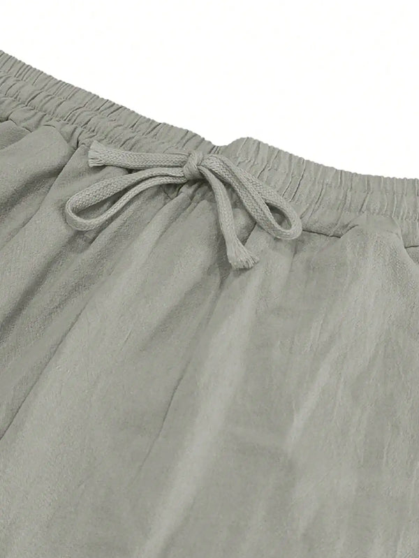 Women's loose fit linen pants with functional pockets and adjustable waist