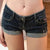 Low-waist casual shorts featuring durable denim fabric and functional zipper closure