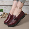 Brown leather loafers with floral embellishment and anti-slip sole for women