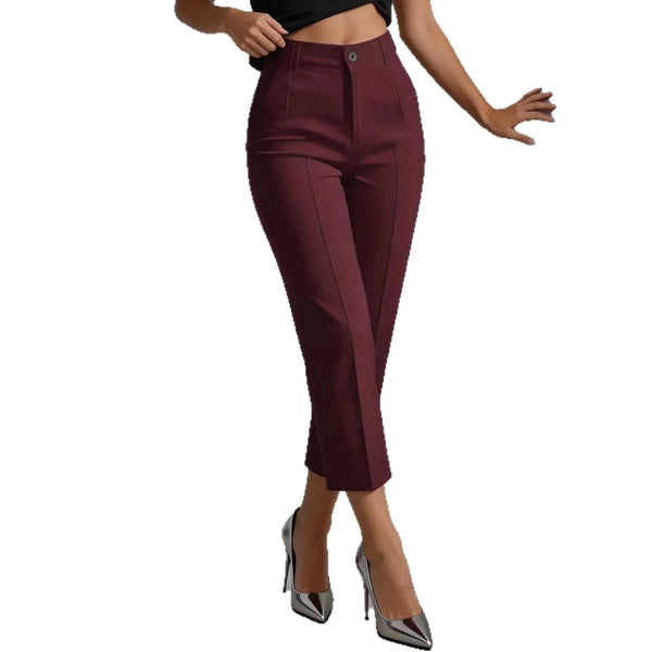 Back view of high-waist trousers highlighting flattering shape and secure waistband fit