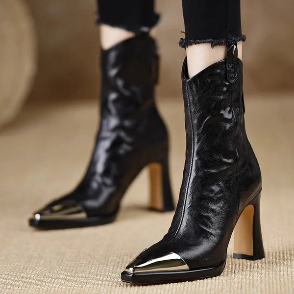 Square toe high heel boots with reflective patent finish and metal hardware