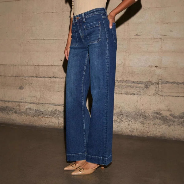 Chic high-waisted wide-leg jeans for women, featuring a relaxed fit, distressed details, and practical pockets for stylish co