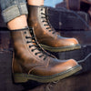 Stylish high-top leather boots with cushioned insoles for comfort.