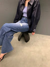 Chic cropped leather jacket for women in premium faux leather, featuring a stylish turn-down collar and secure zipper closure
