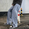 Versatile men's jeans featuring wide-leg cut and hassle-free elastic waistband