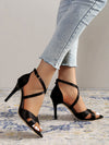 Stylish coral stiletto sandals with an open toe and premium PU upper.