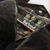 Waxed Cotton Moto Trench Coat with Corduroy Collar, stylish and durable, perfect for all-weather urban adventures.