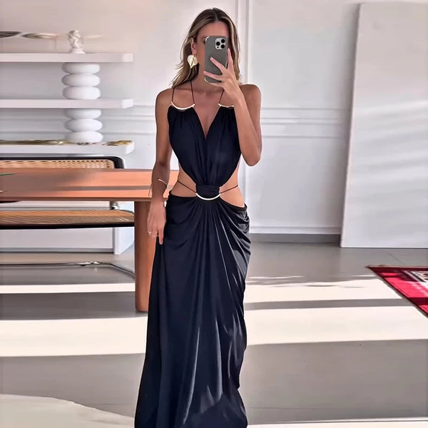Sunset Escape halter dress with elegant open back and flattering waist cutouts