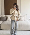 Double-breasted trench coat with adjustable belt in polyester