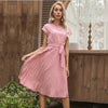 Close up of pleated fabric texture and polka dot pattern