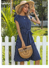 Polka dot midi dress with adjustable sash belt at natural waist