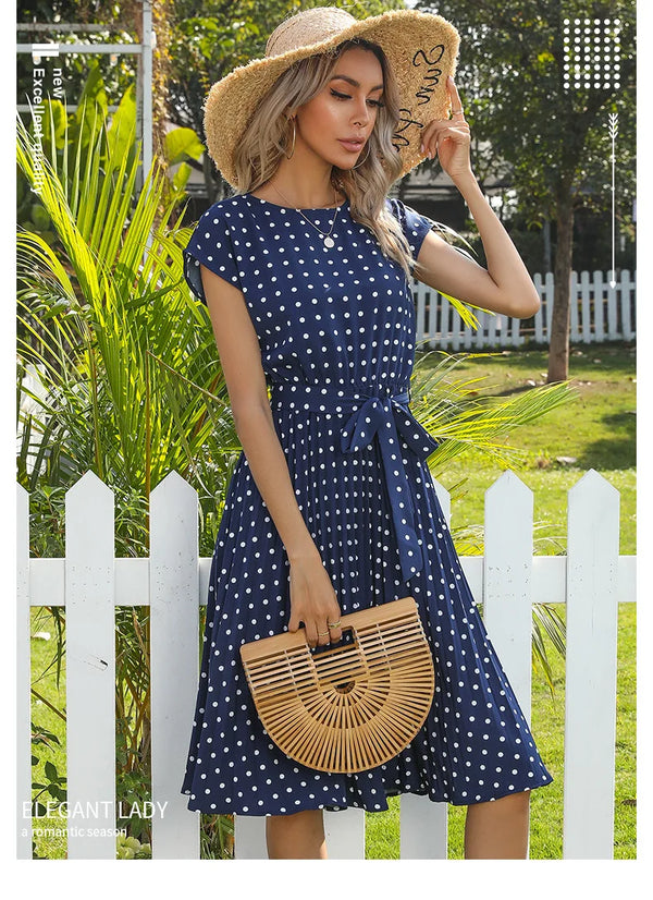 Polka dot midi dress with adjustable sash belt at natural waist