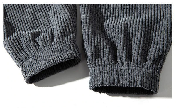 Close-up of ankle cuff detail on fleece-lined corduroy joggers