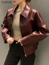 Chic cropped leather jacket for women in premium faux leather, featuring a stylish turn-down collar and secure zipper closure