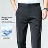 Slim-fit dress pants in black maintaining shape and structure throughout workday