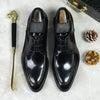 Elegant black leather Oxfords with pigskin lining for all-day comfort.