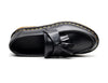 Black tassel loafers showcasing a true-to-size fit for easy wear.