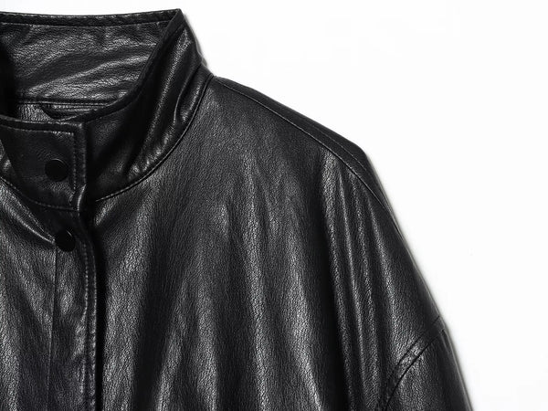 Chic faux leather bomber jacket for women, perfect for autumn fashion and versatile layering with a turtleneck collar.
