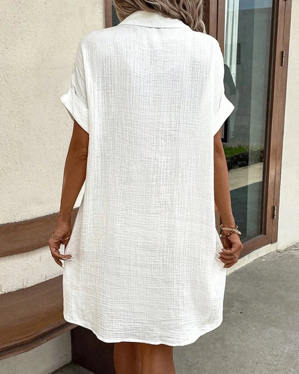Versatile summer dress with pockets, V-neck, and effortless draping silhouette