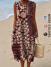 Side profile of woman in flowing bohemian floral midi dress