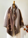 Winter Whispers shawl folded neatly, highlighting its luxurious texture.