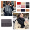 Warm and elegant black scarf, perfect for women’s winter wardrobe.