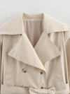 Timeless beige trench with double-breasted front and tie belt