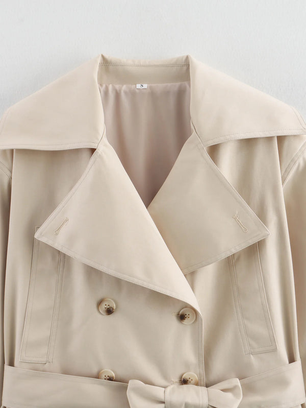 Timeless beige trench with double-breasted front and tie belt