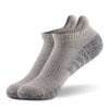 Close-up of thick terry cushioning in running socks, providing plush support for road warriors.
