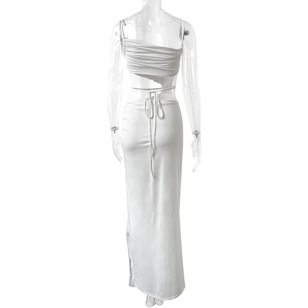 Flowing polyester dress with diagonal neckline and side split