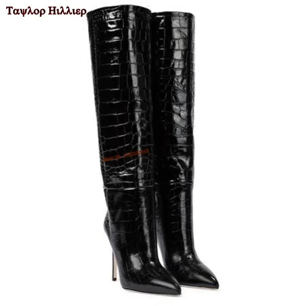 Close-up of the luxurious suede texture on stiletto boots.