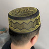 Handcrafted Muslim kufi cap with shimmering gold geometric embroidery for daily prayers