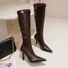Chic black mid-calf stiletto boots with side zipper and pointed toe.
