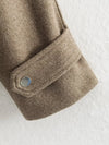 Zip-front jacket with sash belt and turtleneck perfect for crisp autumn mornings