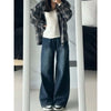 Throwback style baggy fit jeans with functional pockets and classic early 2000s denim aesthetic