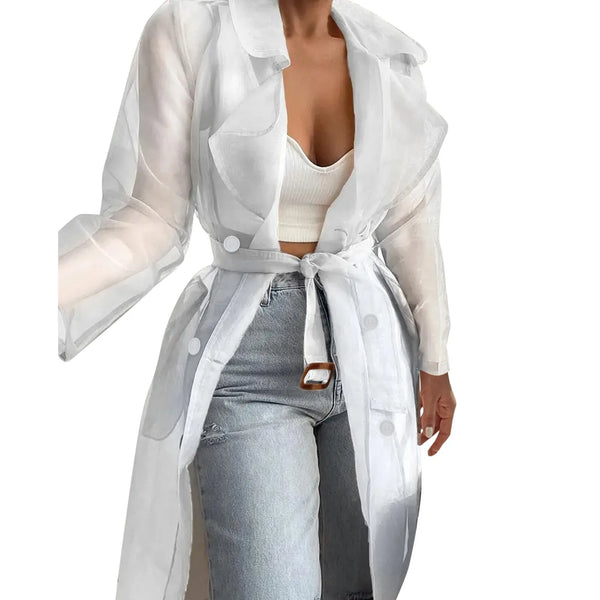 Close-up of functional pockets and clean lines on sheer belted trench coat