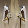 Glamorous stiletto pumps with a unique design and crystal accents.