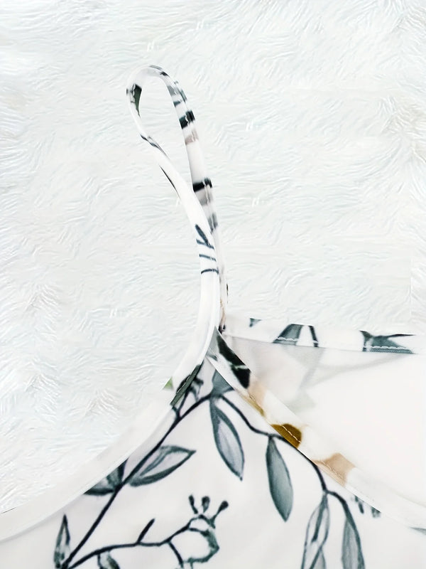 Flowing A-line dress with colorful floral pattern, V-neckline, and versatile ankle-length hem