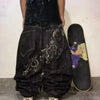 Casual chic jeans with artistic embroidery for self-expression.