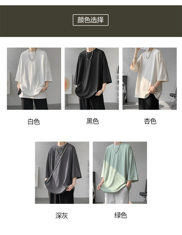 Casual summer outfit featuring striped tee paired with shorts, perfect for beach days.