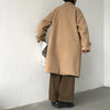 Chic Japanese vintage trench coat for men in black, featuring a single-breasted closure and stylish turn-down collar.