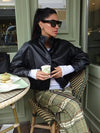 Chic faux leather bomber jacket for women, perfect for autumn fashion and versatile layering with a stylish turtleneck collar