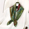 Lightweight polyester scarf in green, easy to wash and maintain.