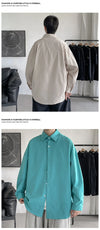Oversized long sleeve casual shirt for men and women with Mandarin collar, perfect for spring and autumn street fashion.
