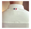Elegant men's slim-fit dress shirt in solid color, perfect for spring, featuring a turn-down collar and long sleeves.