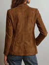 Single-breasted suede blazer featuring multiple pockets, perfect for autumn layering and versatile styling.