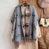Versatile scarf styled as a shawl, demonstrating its generous proportions.