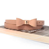 Elegant women's belt with bow detail in faux leather, perfect for casual and formal outfits, featuring a sleek metal buckle.
