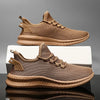 Athletic sneakers featuring breathable air mesh and secure lace-up closure