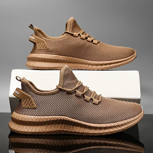 Athletic sneakers featuring breathable air mesh and secure lace-up closure